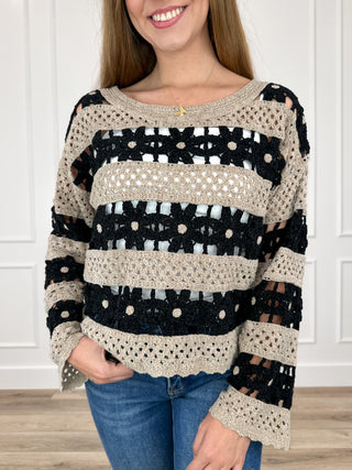 Cropped knit sweater, long sleeves, black and cream striped with dot pattern