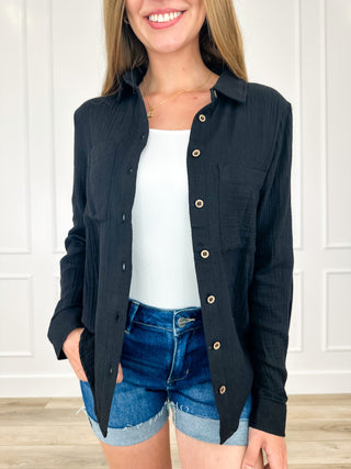 Cotton long-sleeve button-up top in black, button front and pointed collar