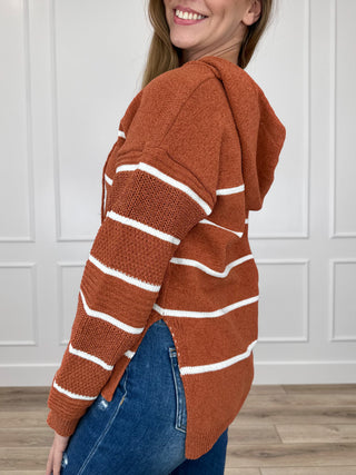 Rust orange striped knit hooded sweater, long sleeves, ribbed cuffs and hem