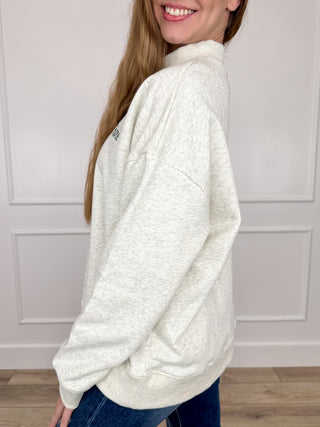 Grey cotton-blend long-sleeve mock-neck sweatshirt, relaxed side profile