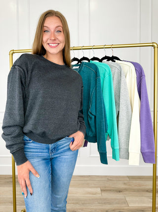 Charcoal crewneck sweatshirt with long sleeves, relaxed fit