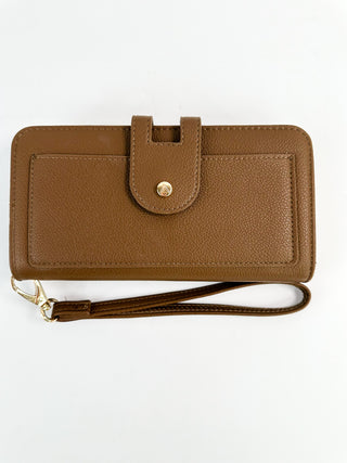 Faux leather wallet, brown, front snap flap, wrist strap, gold hardware.