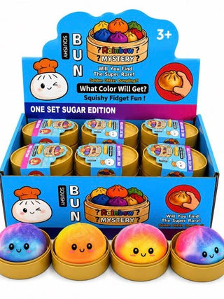 Set of tie-dye dumpling squishy fidget toys with smiling faces in round tins