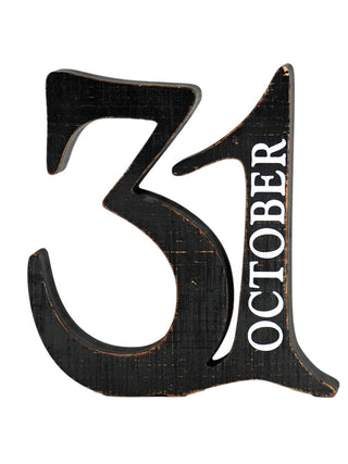 Black wood decor cutout shaped like number 3 with OCTOBER text