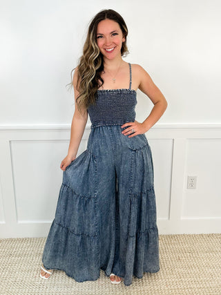 Blue denim tiered maxi dress with smocked bodice and spaghetti straps, sleeveless