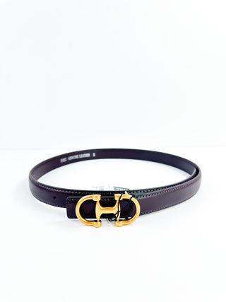 Dark leather belt with gold-tone double-prong buckle and stitched strap edges.