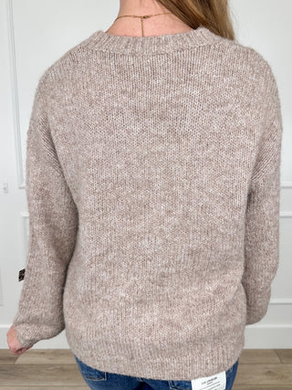 Taupe knit long-sleeve sweater back view with leopard print bow accents