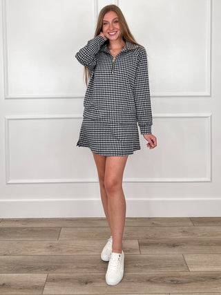 Black and white gingham knit quarter-zip long-sleeve top with kangaroo pocket