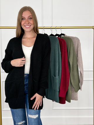 Black knit long-sleeve cardigan with open front and ribbed hem and cuffs