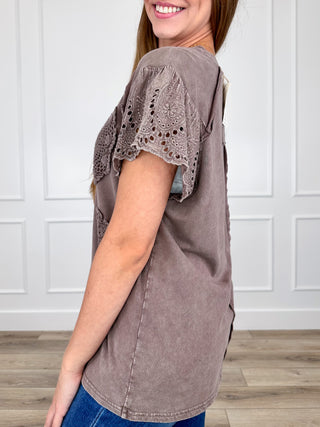 Brown cotton short-sleeve top with embroidered lace sleeve trim and side seams
