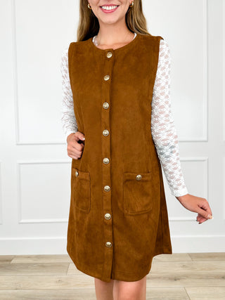 Brown suede button-front sleeveless dress with patch pockets and silver buttons