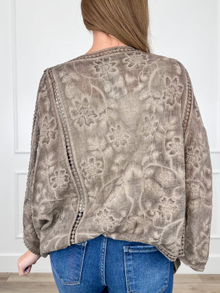 Brown cotton kimono back with allover floral pattern and patchwork-style panels, short sleeves