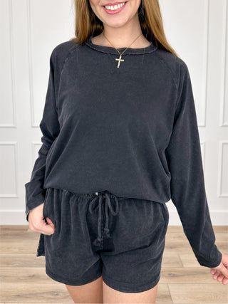 Black cotton-blend long-sleeve sweatshirt with matching drawstring high-rise shorts