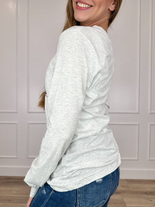 Light grey long-sleeve cotton-blend T-shirt with crew neck and curved side seam