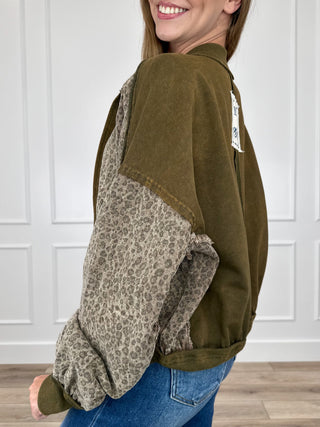 Olive green cotton button-up jacket with patterned sleeves and banded cuffs