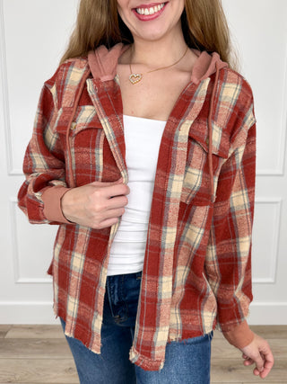 Hooded flannel button-up shacket in brick red plaid, long sleeves, open front