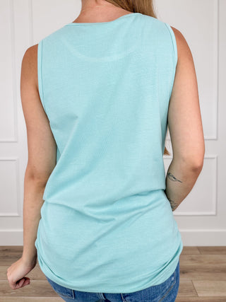 Light blue cotton tank top, back view with curved hem