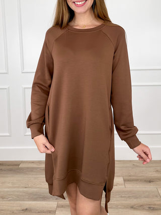 Brown long-sleeve crew-neck mini shift dress with curved hem detail