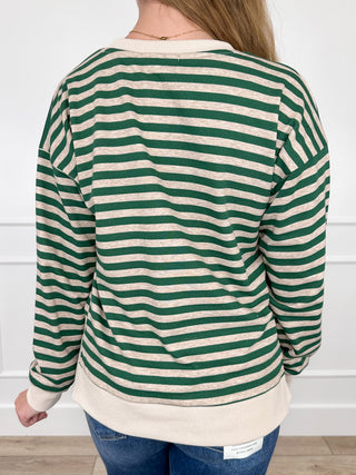 Green and white striped long sleeve top with V-neck, back view, contrast hem band