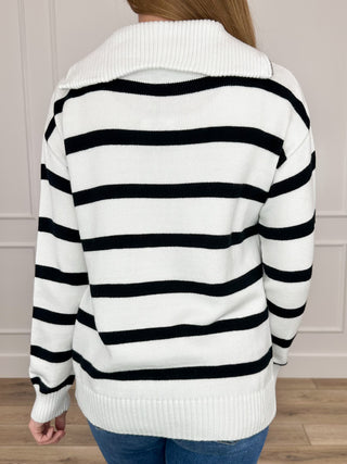 Back view white quarter-zip knit sweater with black stripes, long sleeves