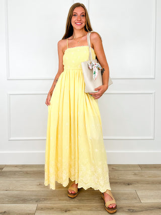 Yellow cotton blend maxi dress with spaghetti straps and tiered skirt