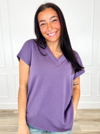 Purple short-sleeve V-neck tee with relaxed fit