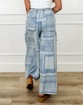 Blue patchwork print wide-leg cargo pants with high-rise elastic waist and roomy fit