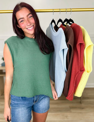 Cotton cap-sleeve sweater top in green knit with crew neckline and relaxed hem