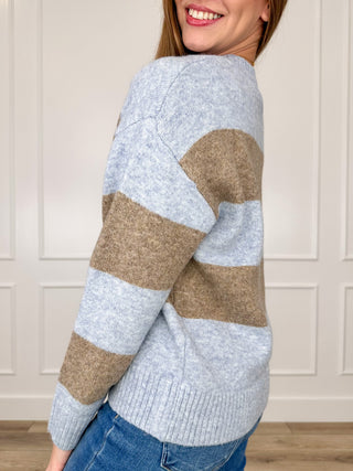 Striped knit sweater with long sleeves and ribbed cuffs, blue and tan colorblock