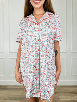 White floral button-up sleep dress with short sleeves, collar, and front buttons