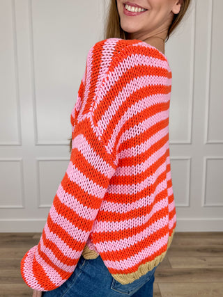 Cropped striped knit sweater top with long sleeves, red-white stripes, tan ribbed cuffs