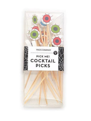 Halloween cocktail picks with green and red eyeball tops on wooden sticks