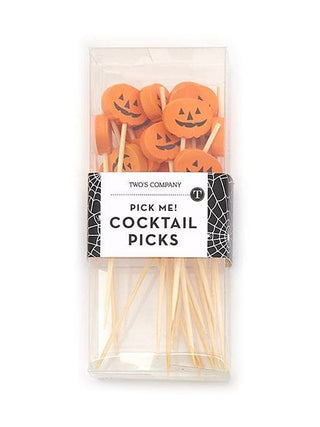 Halloween cocktail picks with orange jack-o-lantern faces on wooden sticks
