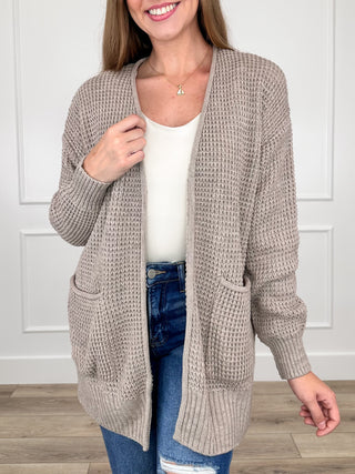 Taupe knit long-sleeve cardigan with open front and ribbed hem and cuffs