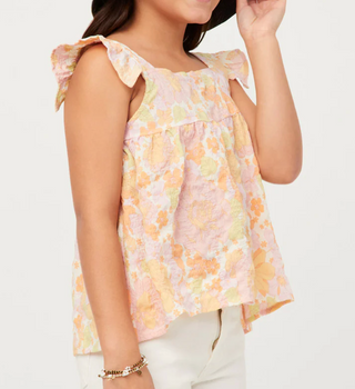 Kids cream floral tank top with ruffled shoulder ties and gathered neckline