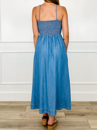 Blue spaghetti-strap maxi dress with smocked bodice and gathered skirt, back view