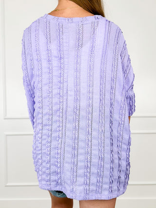 Lightweight short-sleeve knit top in lavender with vertical cable-knit texture
