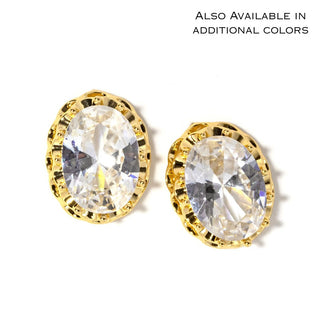 Oval crystal stud earrings with gold-tone bezel and clear crystal