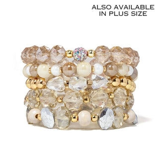 Beaded bracelet stack with clear, beige, white stones and gold-tone bead accents