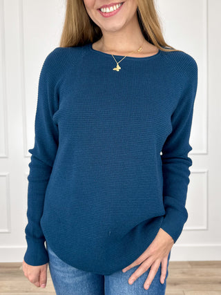 Blue knit long-sleeve crewneck sweater top with relaxed fit