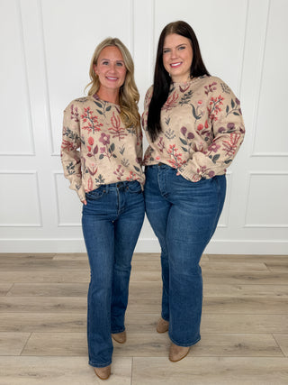 Dark blue bootcut jeans with tummy control, front pockets and belt loops, non-distressed
