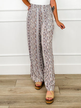 High-rise rayon pants with allover multi-color vertical pattern, elastic waistband, wide leg