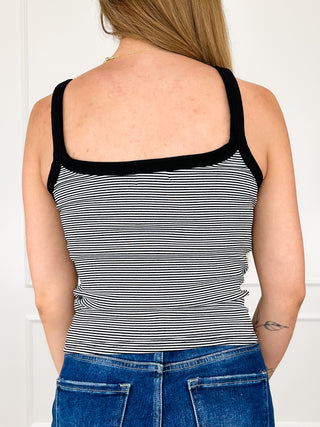 Back view of black and white striped cropped tank top, sleeveless