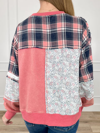 Back view pink cotton-blend long sleeve top with plaid yoke and floral lower panel