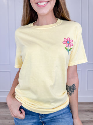 Yellow cotton short-sleeve graphic tee with pink flower on chest