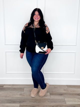 Dark wash denim skinny jeans, high-rise fit, smooth non-distressed finish, full length.