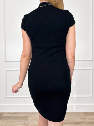 Black ribbed knit midi dress with short sleeves, back view