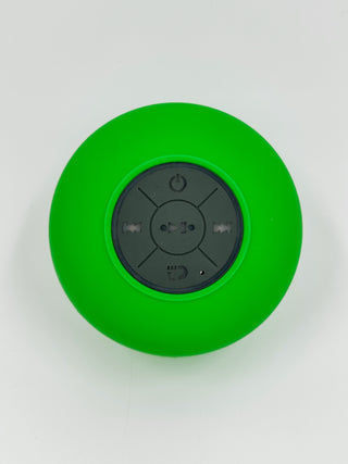 Green round Bluetooth speaker with top control icons and power button