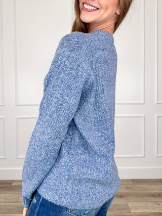 Blue knit long-sleeve sweater top with heather texture and crew neck