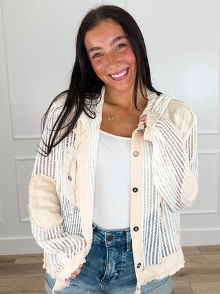 Cream hooded knit button-up top with long sleeves and open front
